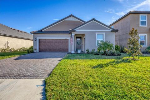 Discover modern elegance in this stunning 3-bedroom 2.5-bath home with a dedicated office/den, located in the highly sought-after Twin Rivers community of Parrish. Built just two years ago, this home offers contemporary design with crown molding, ene...