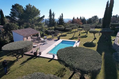 Cotignac, one of the 'plus beaux villages de France', located between the Gorges du Verdon and the Côte-d'Azur, at the foot of an impressive cliff. Close to the village and all amenities, this lovely Provencal house sits in the heart of a superb, fen...