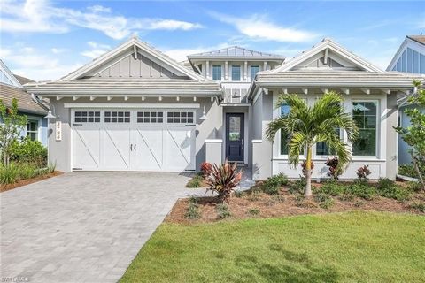 COASTAL CONTEMPORARY, DESIGNER DECORATED AND HIGHLY UPGRADED ACACIA GRANDE has the 4TH BEDROOM that is so highly desired. This exquisite FULLY FURNISHED residence in the prestigious Isles of Collier Preserve, offers unparalleled luxury and comfort. A...