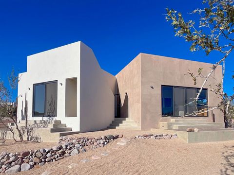 Eco Conscious Elegance in Baja California Sur This brand new home is a masterpiece of thoughtful design and sustainable living tailored to the unique terrain and climate of Baja California Sur. The home's architecture takes full advantage of the morn...