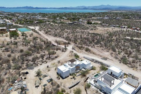 Indulge in luxury living in this exquisite finished home in the prestigious Centenario hills of La Paz BCS. With magnificent ocean vistas captivating city lights and breathtaking desert scenery this residence provides an unparalleled visual experienc...