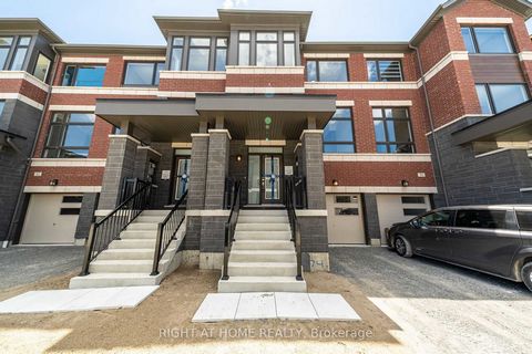 Welcome to 56 Douet Lane, your dream townhome! This spacious 4-bedroom, 4-bathroom gem is designed for modern living, featuring sleek finishes, soaring 9-foot ceilings on the main floor, and an open-concept layout that offers a sense of freedom and f...