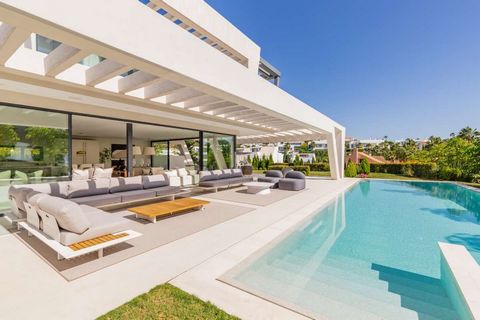 This outstanding contemporary masterpiece is situated in Nueva Andalucia, just 700m from the club house of Los Naranjos and 5kms from Puerto Banus with wide range of amenities. The property built over 3 floors and spanning over the plot of 1.420sqm f...