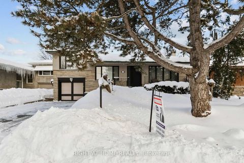 Rarely offered, fully renovated luxury home featuring 5 bedrooms, 4 bathrooms, and over 3,700 sq. ft. of exceptional living space. This spectacular family residence offers three walk-outs, an in-law suite with a separate entrance, and two newly renov...