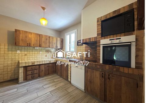 Maison de plain-pied de 100m², jardin et garages