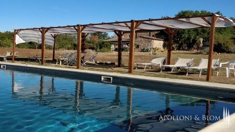 Dating back to the 1700s, this traditional stone farmhouse is for sale with annexes, swimming pools and DOC vineyard set in a 70 hectare / acre estate surrounded by ancient oak trees near Grosseto, Tuscany. The two level farmhouse divided into six ap...