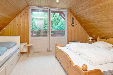 Holiday cottage located at a forest. Bright decor with comfortable furniture. There is a heat pump that can also work as aircondition in the summer and re-use the heat in the winter. The house is located on a large natural plot with a covered terrace...