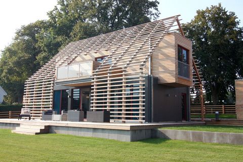 Cozy holiday experience in an exclusive, modern and innovative chalet over 2 floors on the grounds of the Bernsteinschloss Wendorf near Schwerin. With 80 m² of living space and extremely comfortable and modern furnishings, the domicile is a true oasi...