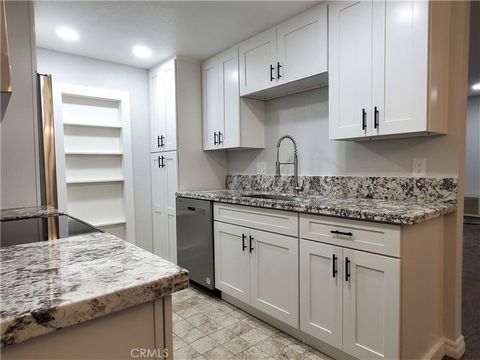NEWLY REMODELED 2 BEDROOM/ 2 BATH LOWER UNIT CONDOMINIUM IN THE BEAUTIFUL PHEASANT CREEK COMMUNITY OF LAKE FOREST. This lovely home features an all new kitchen including granite counters, white shaker-style cabinets, new appliances including a 17 cub...