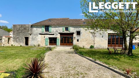 A13230 - Large converted Charentaise stone barn with original features in the centre of a small village, opposite vineyards & fields. Needing some minor work to transfer from a holiday home to a primary home, ie downstairs toilet (plumbing in place) ...