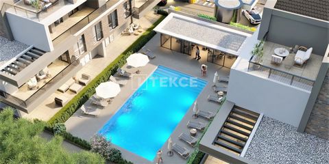 Apartamentos en un complejo con piscina y aparcamiento en Gemlik Bursa Los apartamentos están situados en el barrio de Kurşunlu en Gemlik, Bursa. Kurşunlu es un popular destino de vacaciones por su costa y su mar. Cuenta con un ambiente colorido con ...