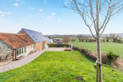 The expert conversion of this stone-built agricultural barn has created a four-bedroom country home that's full of traditional character yet with contemporary styling and lots of luxurious, light-filled spaces. Set amidst the beautiful rolling countr...
