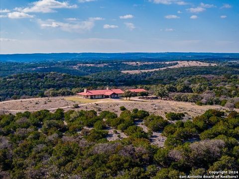 49.93 +/- acre Ag-Exempt ranch w/diverse landscape of native grasses, a ravine w/seasonal creek, hardwoods & brushy cover. Mesa top home features standing seam roof, stucco exterior, large porte cochere & deep wrap-around tiled porch w/outdoor firepl...