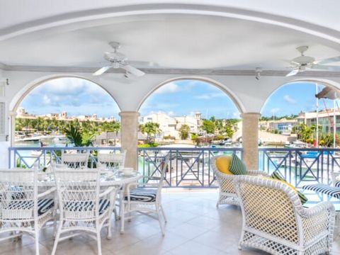 Laid out on one easy level, this apartment is located on the middle floor on one easy level. Beyond the tropical elegance of the living room, a wide terrace provides an outdoor sitting and dining area overlooking the crystalline water. The spacious k...