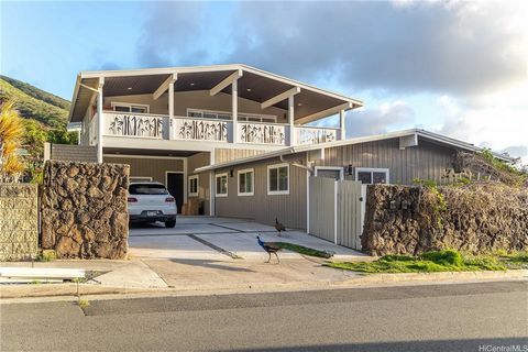 Welcome to this stunning home nestled in the serene beauty of Honolulu's Koko Head area. This exquisite property boasts breathtaking views of the ocean, marina, mountains, and vibrant sunsets. The original home, constructed with timeless redwood, fea...