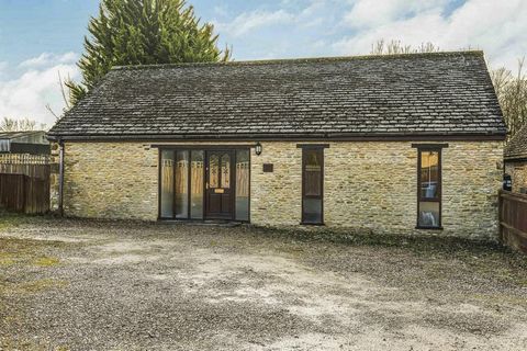 A two bedroom detached stone-built barn conversion converted in the 1990's, with a secluded rear garden and parking, on a small development of just five properties in the heart of the desirable village of Duns Tew. Approached via a gated entrance, an...