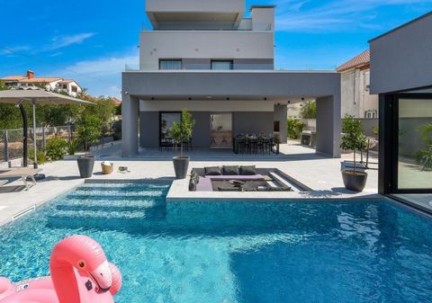 Fantastic modern villa in Zadar just 180 meters from the sea Magnificent new villa with  swimming pool in the center of Zadar yet in a quite place! Sea view! Super modern architecture! Just 180 meters from the sea and 10 minutes from the center of th...