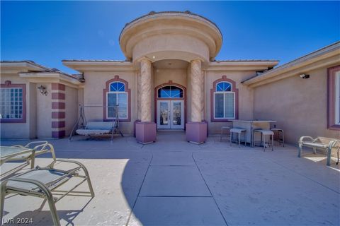 Welcome to your dream oasis in Pahrump! This stunning one-story home sits on over half an acre of land, boasting breathtaking mountain views that will captivate you at every turn with only one neighbor. Step inside to discover a beautifully appointed...