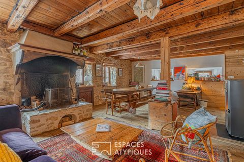 In the heart of the Vercors, in the commune of Rencurel, it is in a small traditional hamlet made of local stone that this elegant semi-detached farmhouse is located. Built at the beginning of the nineteenth century, it retains all the characteristic...