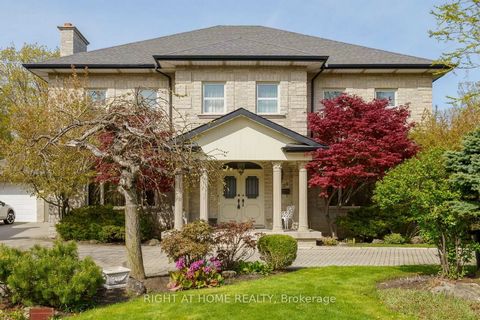 Welcome to your new estate home! This stunning custom build on a private ravine setting boasts over 8000 square feet of living space which includes 4780sq.ft above grade. Approaching the home, you'll be struck by the elegant stone exterior and large ...