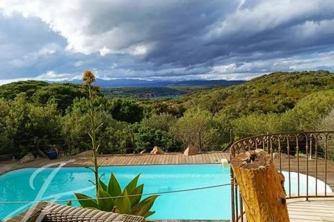 In a preserved environment near the very famous Maora beach in the Bay of Sant'Amanza, Charming Bastide built in Bonifacio granite on a plot of 2005m2, with a splendid bay-view and as far as the eye can see the scrub and the mountains. Very beautiful...