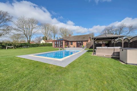 This spacious, single storey property, extensively improved by the current owner, sits on a beautiful three quarter acre plot (stms) in the heart of a charming Suffolk village. The property offers four generous bedrooms, a modern fitted kitchen/break...