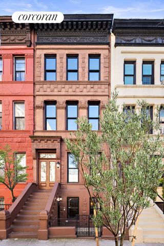 Situated mid-block on this distinctive Upper West Side brownstone street, this elegant and sun-flooded 18.7' wide, 4,100sf home with meticulously restored original millwork includes four bedrooms, four full bathrooms and a delightful south facing gar...
