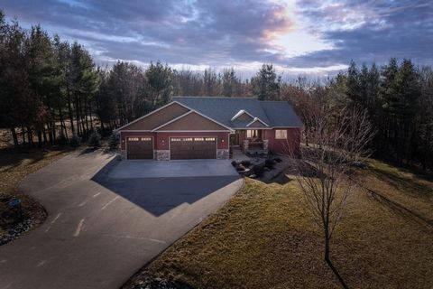 This enchanting home offers a warm and inviting atmosphere, emitting a cozy charm amid the surrounding woods. Providing a peaceful retreat from the hustle and bustle of everyday life. With its cozy interior and picturesque surroundings, this home rev...