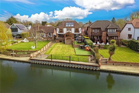 Discover a Spectacular Retreat on the Banks of the Thames! Indulge in the essence of luxurious riverside living at this remarkable address nestled in Wraysbury. Set along the tranquil shores of the Thames, this exceptional 5 bed property embodies sop...