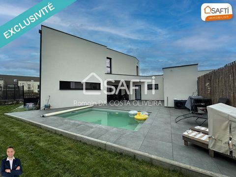 Superbe maison moderne de 5 pièces disposant d'un jardin, d'une piscine, d'une grande terrasse et d'un garage !