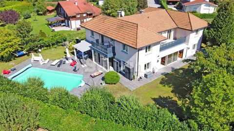 Ref. 694MR: Divonne-Les-Bains, in a cul-de-sac near the Chavannes-de-Bougis customs, you will be charmed by this 8-room house of 630m2 including 375m2 of living space built on a plot of 1525m2. It is composed of a fitted kitchen, a spacious living/di...