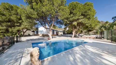 This breathtaking 10-hectare (24.7 acres) finca nestled in the hills of Águilas boasts two charming houses. The main house, a detached cortijo of 2,260 square feet (210 m²), combines modern comfort with delightful Spanish details. It features three b...