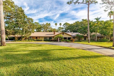 Unique 3.5 acre property minutes to the beach. Property incl. 6000 (+-) main home, beautiful McKee Gardens like trails, 2000 sf. workshop, 4 car carport. Also included is a 2000 sf guest house w/pool 4 car carport. Property has many options to remode...