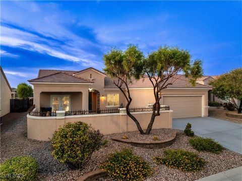 Stunning residence the in desirable Sun City Anthem community of Henderson. Beautifully designed home features spacious living areas, a custom oversized courtyard with covered patio and french doors from the eat-in kitchen and an abundance of natural...