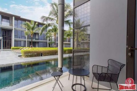 A two bedroom, two bath condo for sale on Mai Khao Beach. This unit is on the 1st floor and is a spacious 129 sqm. The apartment is has a large open living plan with a living room, dining table that seats four and a fully equipped western kitchen. Th...