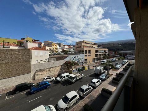 Great apartment for sale in Alcalá, Guía de Isora. This property offers 2 large bedrooms, 1 full bathroom, separate equipped kitchen, utility room, a cozy living room and a balcony with side views of the mountains and the ocean. Sold furnished. Featu...