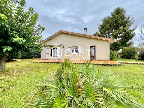 Maison plain-pied avec grand jardin et garage
