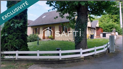 Maison individuelle avec véranda, garage et jardin