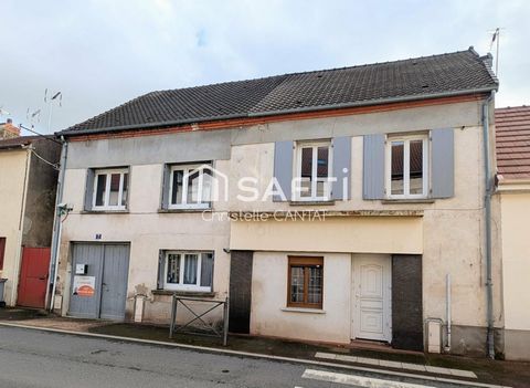 Immeuble avec un F4, un F3, garages et dépendance.