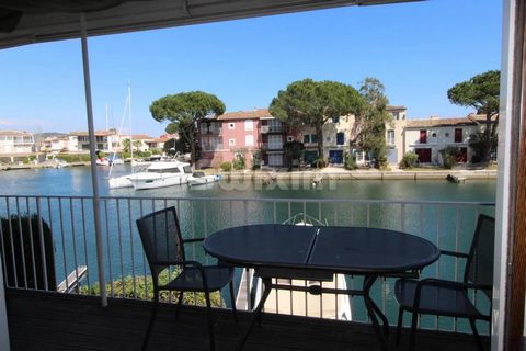 REF 66339EP: In a charming secure area of PORT-GRIMAUD, for sale a crossing apartment of 36m2 consisting of a living room, kitchen and lounge area. A bedroom that overlooks a very quiet little square, a shower room and its toilets. You will be seduce...