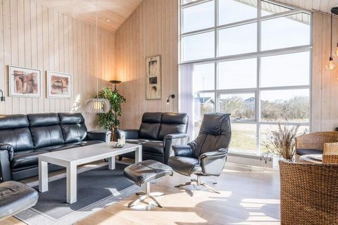 Well-kept and well-appointed cottage, located a few minutes walk from the North Sea and Ringkøbing Fjord. In this beautiful cottage you and the family can relax in the cozy living room in front of the wood stove, where you have a view of Ringkøbing F...