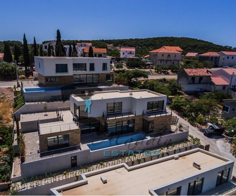 Super luxurious and modern villa on two floors in Okrug Donji, in the sixth row to the sea. New construction, with 322 m2 of living space, outdoor heated pool of 30 m2 and a very landscaped garden of about 450 m2. The ground floor consists of two ele...
