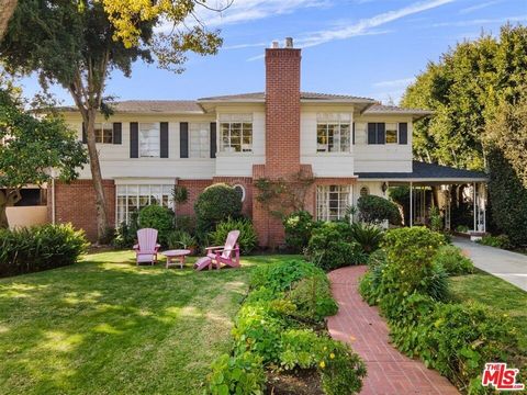 Major $250,000 price adjustment and the lowest priced property on the market, centrally located in the Golden Triangle's coveted west-end Flats of Beverly Hills. This fabulous neighborhood is filled with charm and is on one of the most picturesque st...