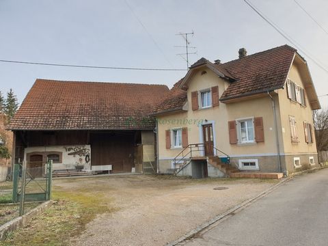Oltingue, in a quiet area, village house of about 120m2 on 6.92 ares and 190m2 of outbuildings. Entrance, kitchen, 3 rooms. Upstairs with 4 bedrooms, bathroom and toilet. Cellar. Barn in good condition and soup in front of the house. Work is to be ex...
