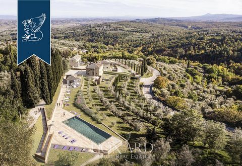 Historical estate for sale in a dominant position on the hills of the Val di Chiana, between the cities of Arezzo and Siena. It is an exceptional real estate complex that includes 8 buildings, for a total of 2000 square meters, and an extraordinary e...