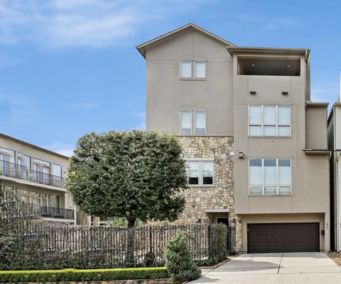 Discover this magnificent four-story home in Rice Military, offering breathtaking views of Downtown Houston. Step into the landscaped patio with hot tub, enjoy upgraded flooring and lighting, and indulge in the chef's kitchen with granite countertops...