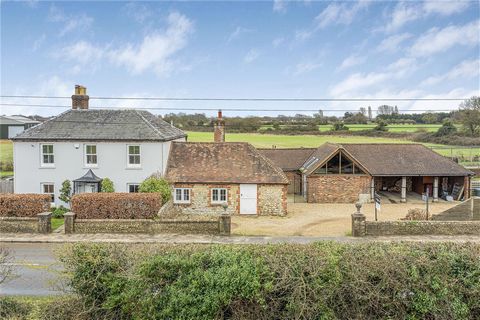 A handsome 3038 sq.ft Georgian home on the outskirts of Chichester, surrounded by farmland. Annexe and a triple car port. Nestled in the charming village of Donnington, just two miles south of Chichester, stands this elegant character property with G...