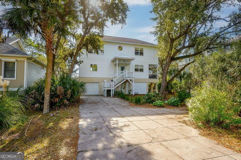 Situated on Ocean Creek Blvd, this delightful residence features a unique reverse floor plan boasting four bedrooms and three bathrooms. The second-floor placement of the living area and kitchen offers not only a functional layout but also stunning o...
