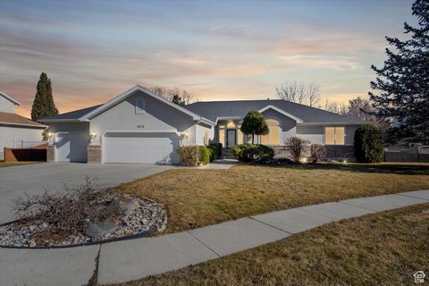 Beautiful 5 bedroom Rambler located in the highly sought after area of Wasatch Downs in South Jordan. Bright and spacious with natural light cascading into every room. The master bedroom is extra spacious with more than enough space for your King siz...