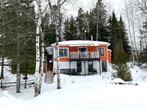 Your dream can come true..... Here is a 3-season cottage for sale on the shores of Lac Vert in St-Ambroise, with no rear neighbors./n/rThis cottage is sold furnished with appliances and many inclusions (see the list of inclusions). You could occupy i...
